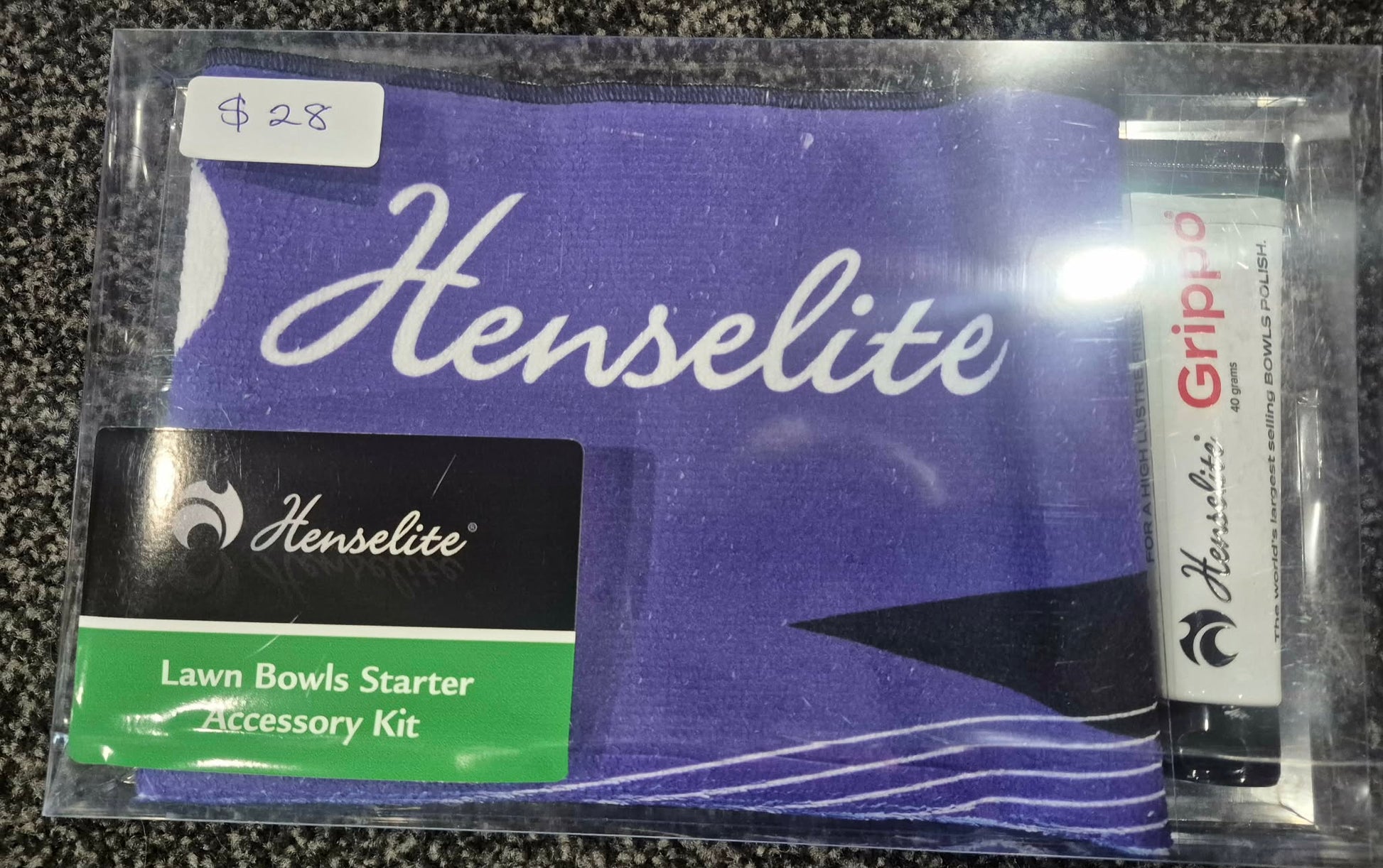 Henselite lawn bowls starter accessory kit in packaging on a textured surface